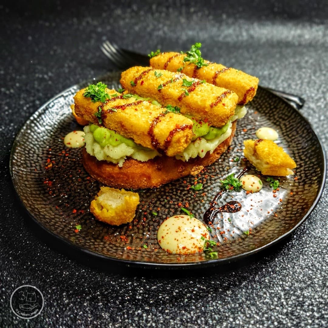 Plant-Based Fishless Fingers with Mash and Peas on Toast