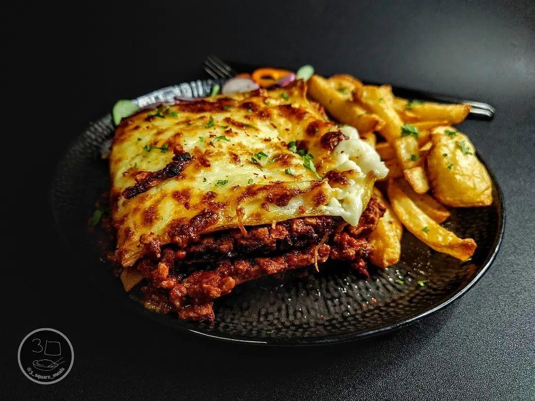 Vegetarian Lasagne with Chips and Salad