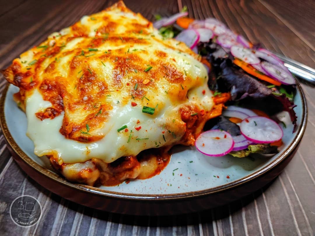 Tikka Lasagne with Tikka Strips and Cheese Sauce