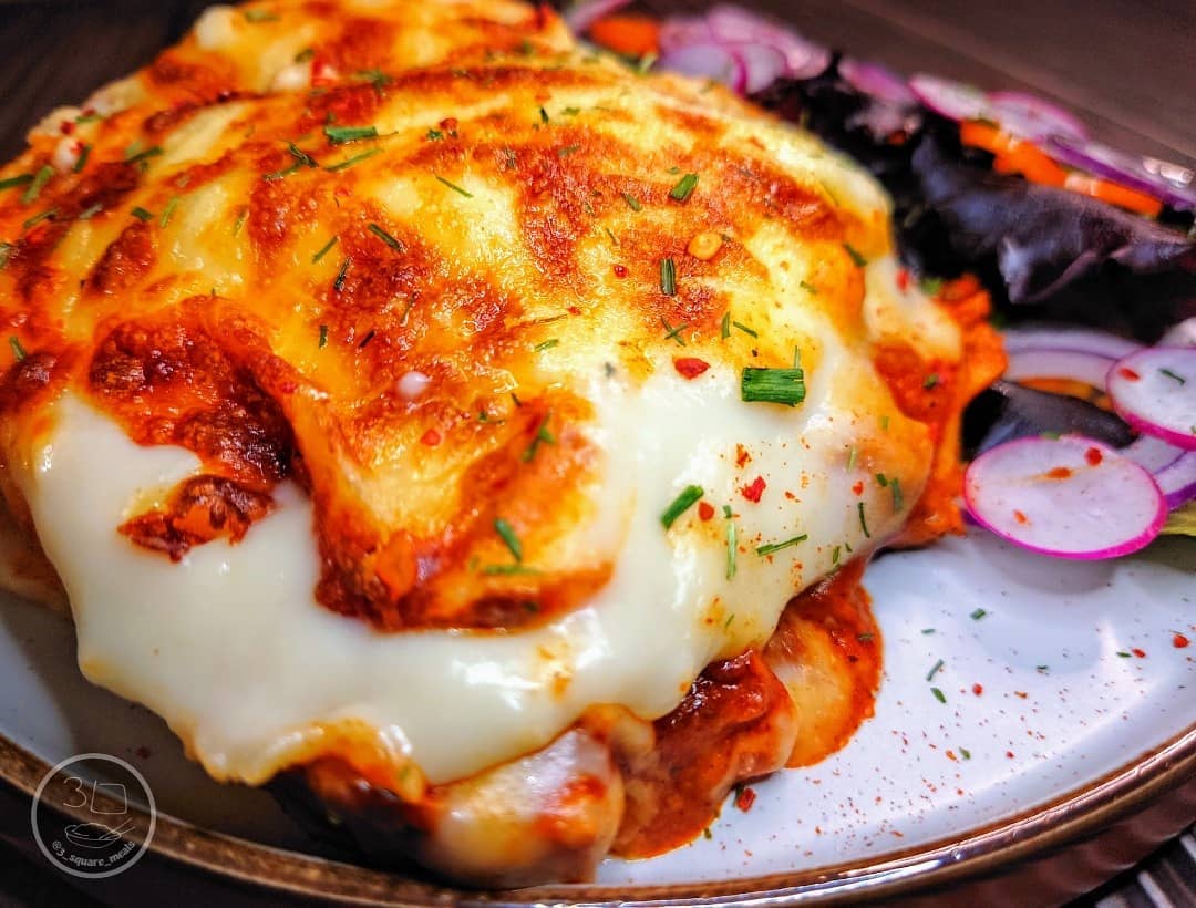 Tikka Lasagne with Tikka Strips and Cheese Sauce