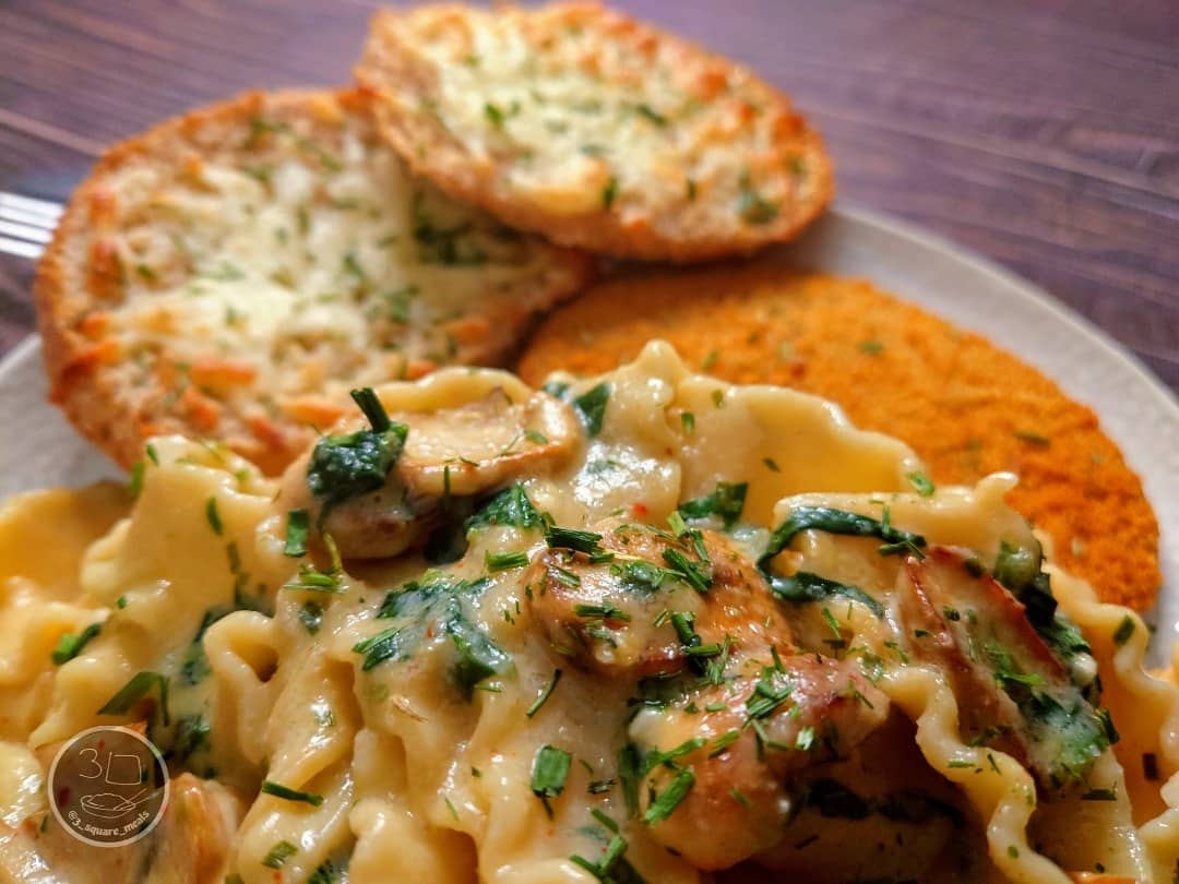 Schnitzel with Mafalde Pasta and Cheesy Garlic Bread