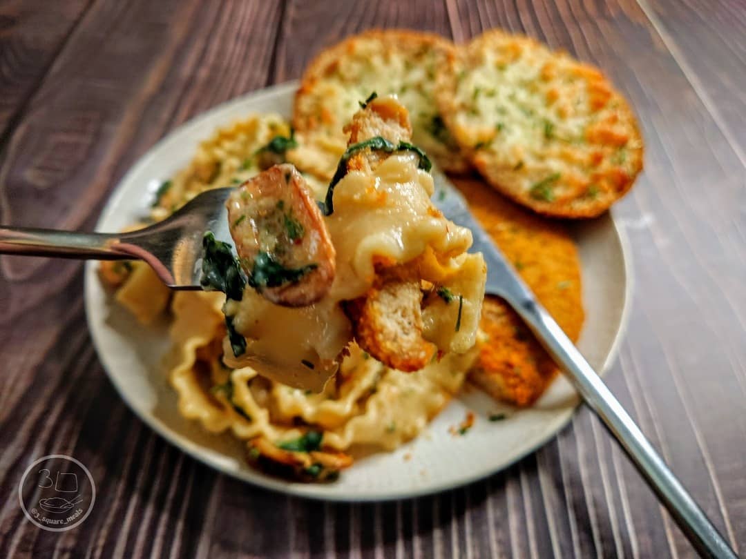 Schnitzel with Mafalde Pasta and Cheesy Garlic Bread