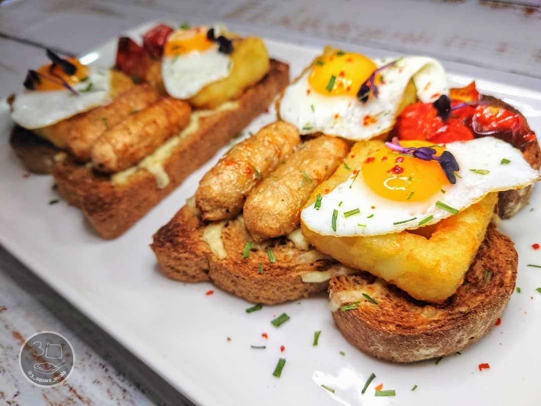 Breakfast on Toast with Cheese and Eggs