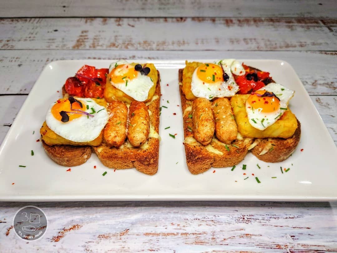 Breakfast on Toast with Cheese and Eggs