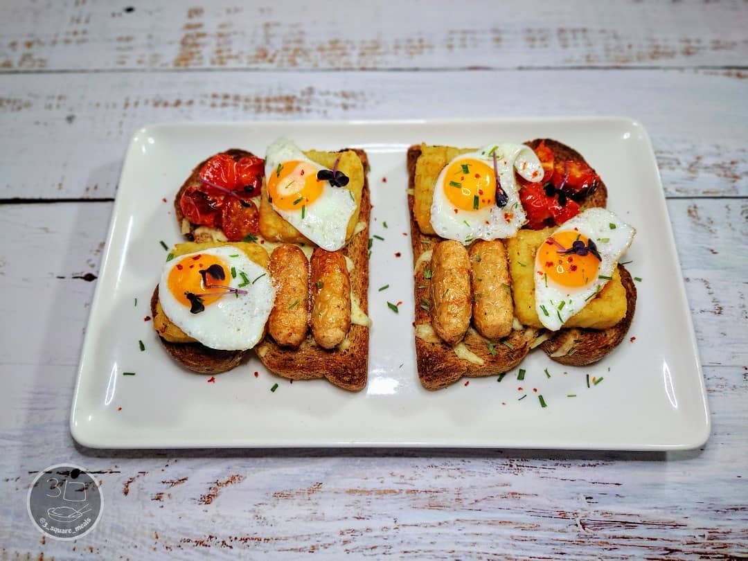 Breakfast on Toast with Cheese and Eggs
