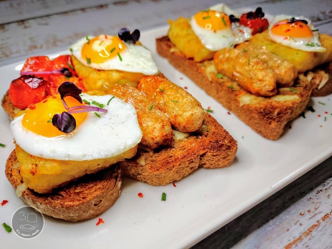 Breakfast on Toast with Cheese and Eggs