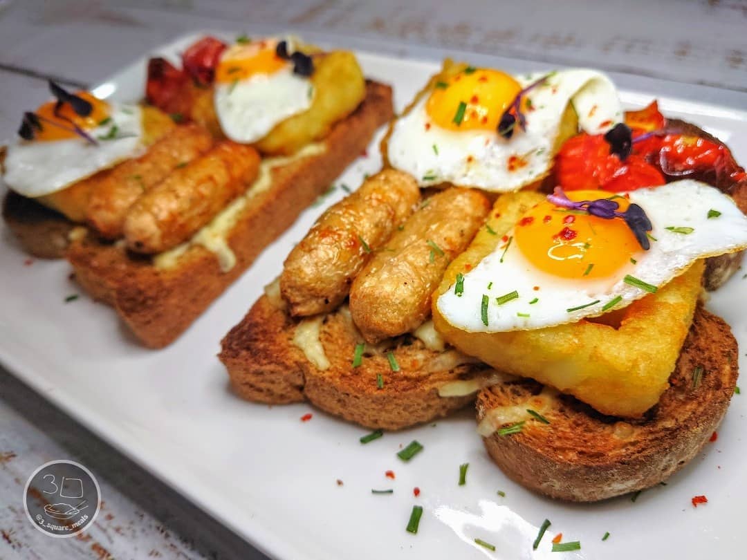 Breakfast on Toast with Cheese and Eggs