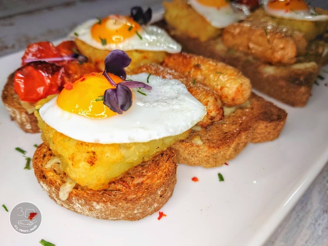Breakfast on Toast with Cheese and Eggs