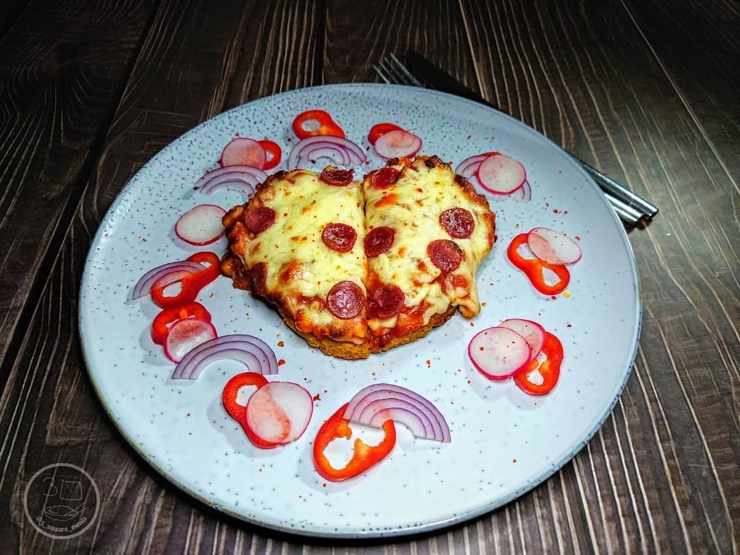 Schnitzel Pizza with Veggie Toppings
