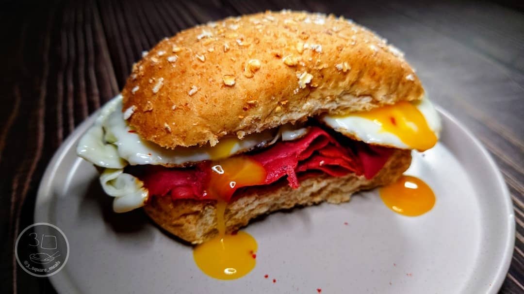 Egg and Pastrami Breakfast Sandwich