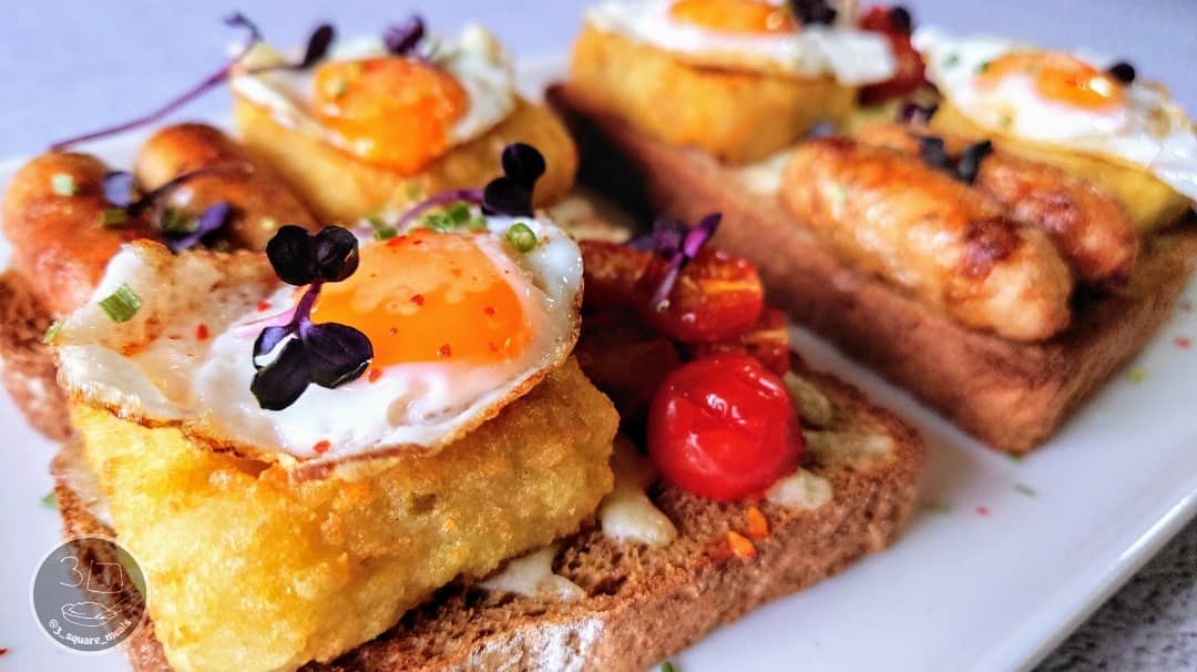 Breakfast on Toast with Eggs and Hash Browns