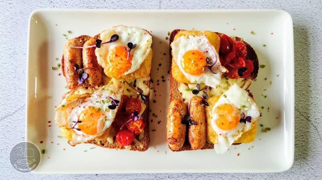 Breakfast on Toast with Eggs and Hash Browns