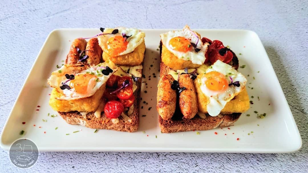 Breakfast on Toast with Eggs and Hash Browns