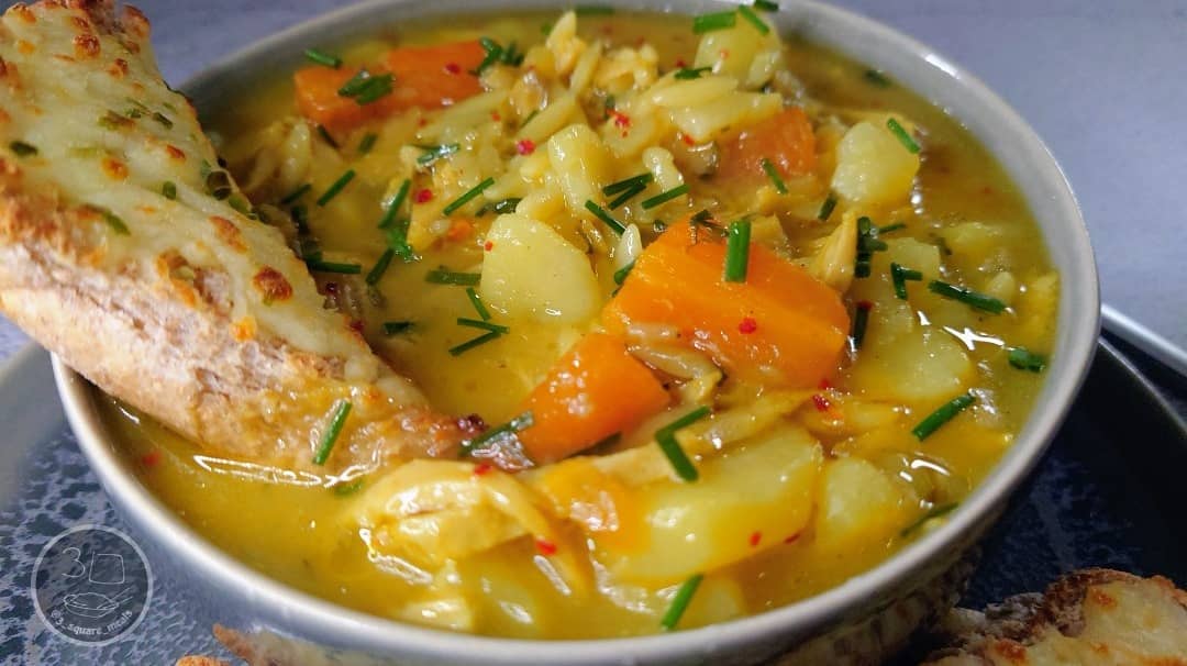 Hearty Vegetable Soup with Cheesy Garlic Bread