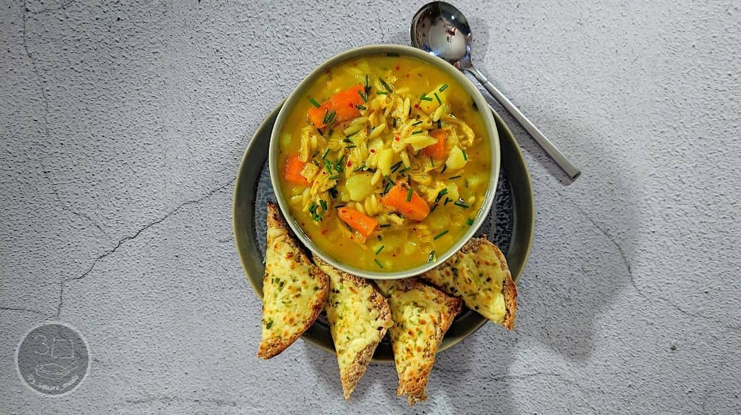 Hearty Vegetable Soup with Cheesy Garlic Bread