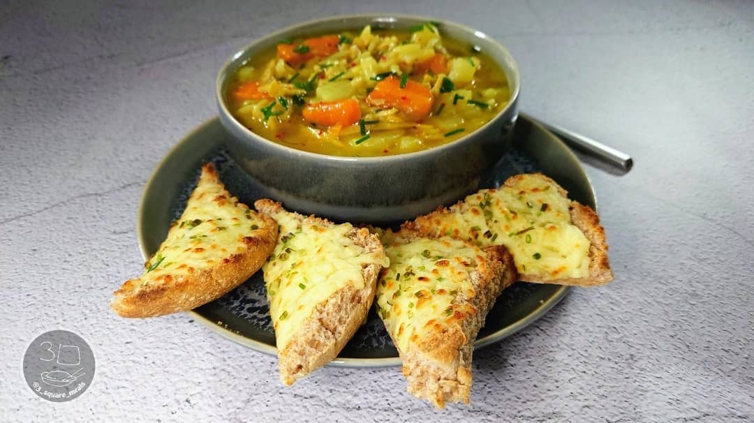 Hearty Vegetable Soup with Cheesy Garlic Bread