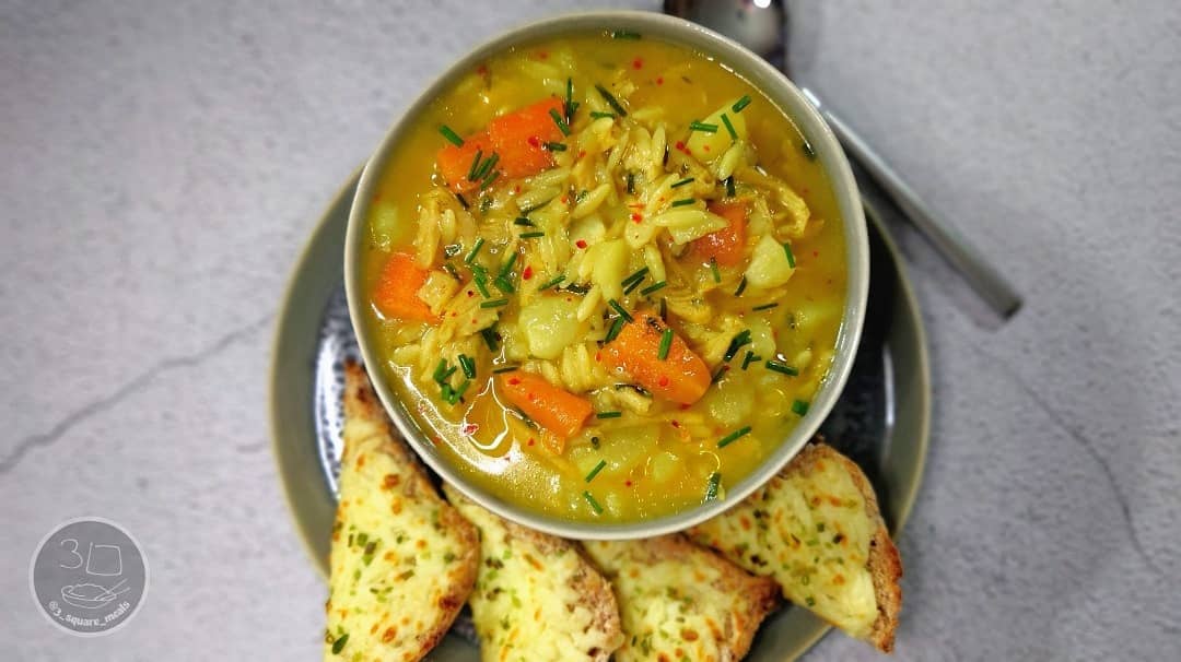 Hearty Vegetable Soup with Cheesy Garlic Bread