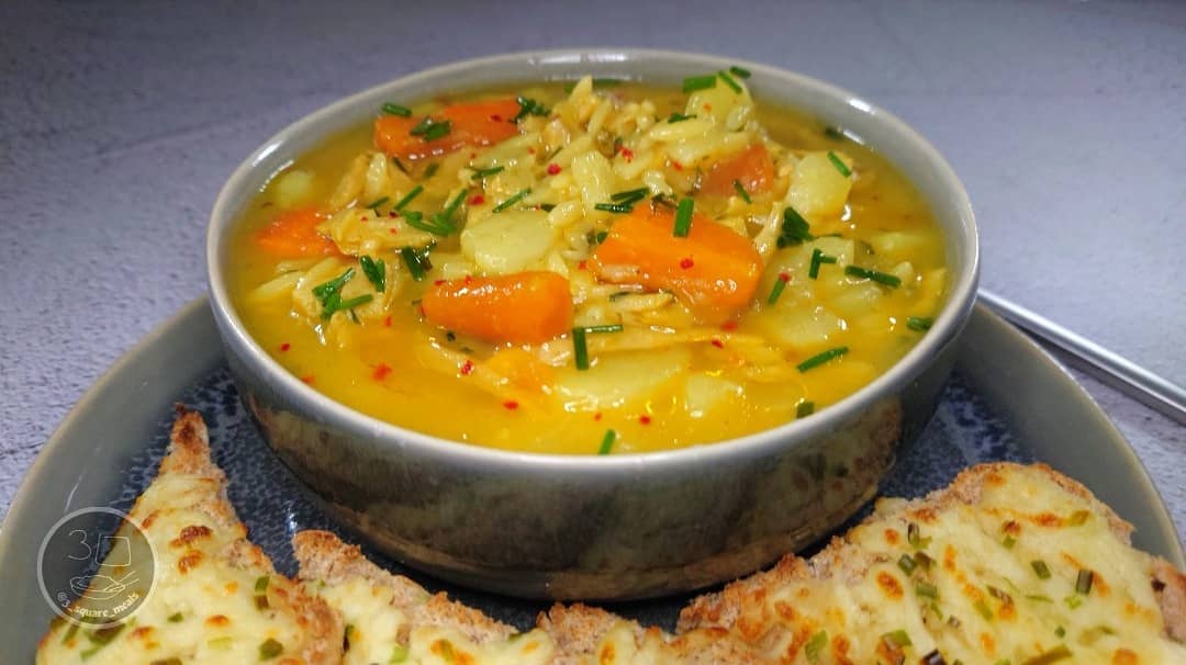 Hearty Vegetable Soup with Cheesy Garlic Bread