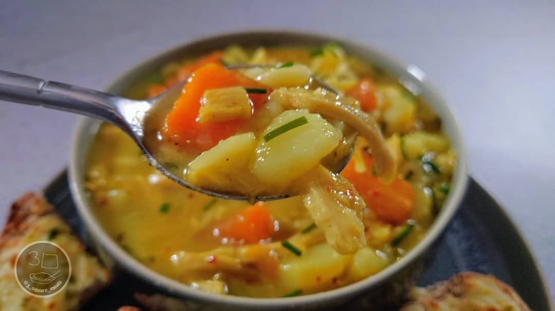 Hearty Vegetable Soup with Cheesy Garlic Bread