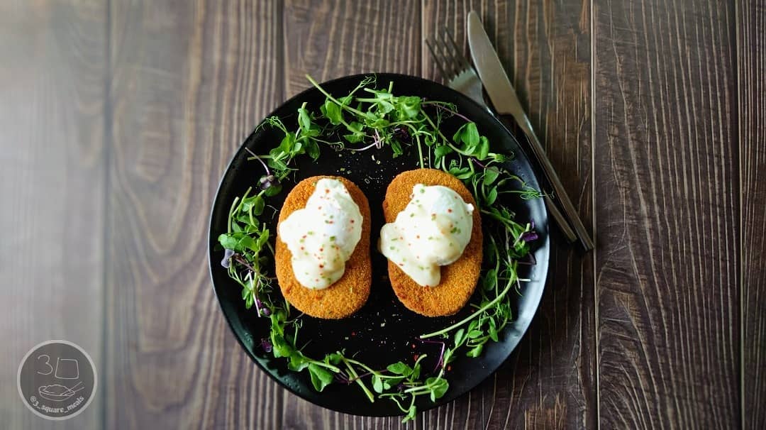 Vegetarian Schnitzel and Poached Eggs Breakfast