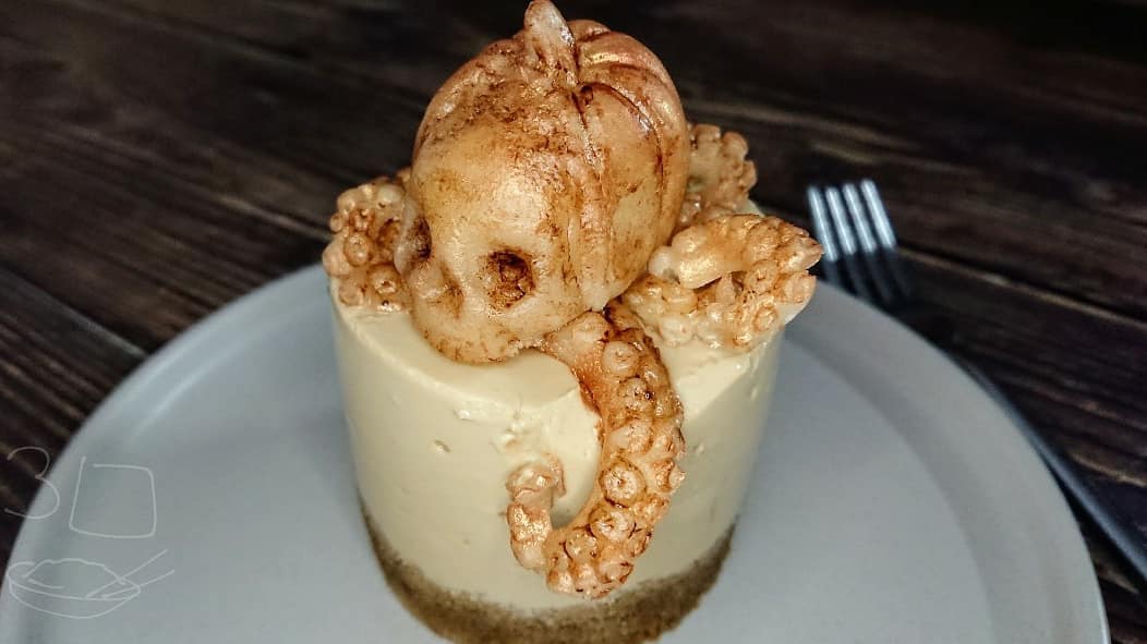Coffee Almond Cheesecake with Marzipan Topper
