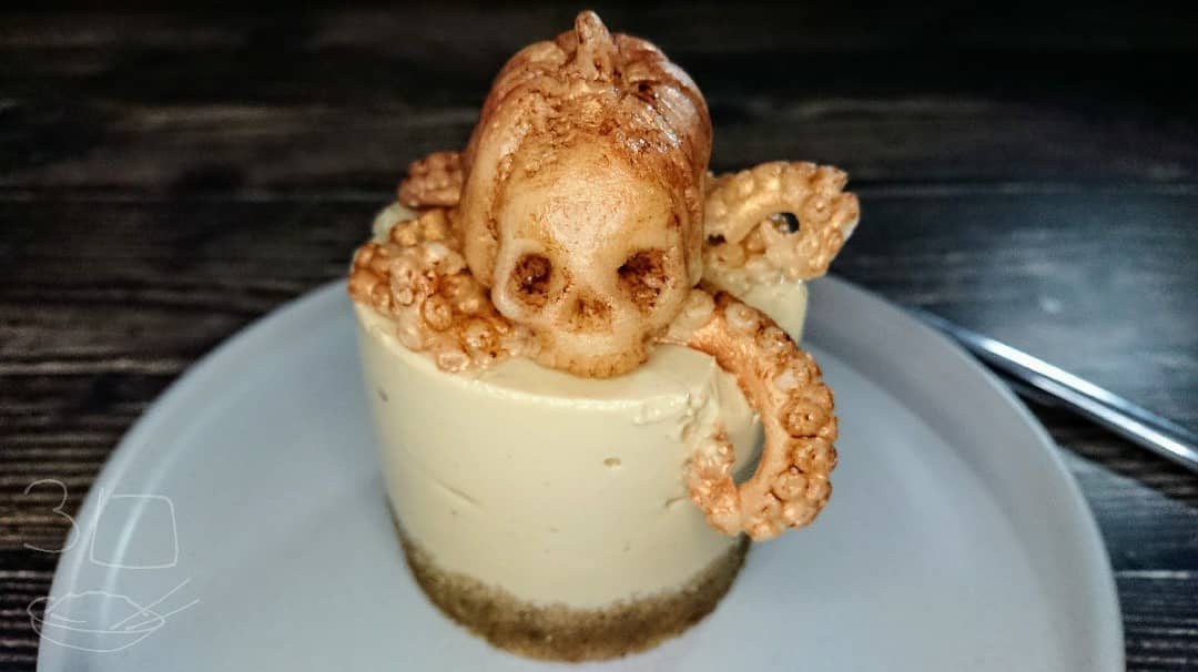 Coffee Almond Cheesecake with Marzipan Topper