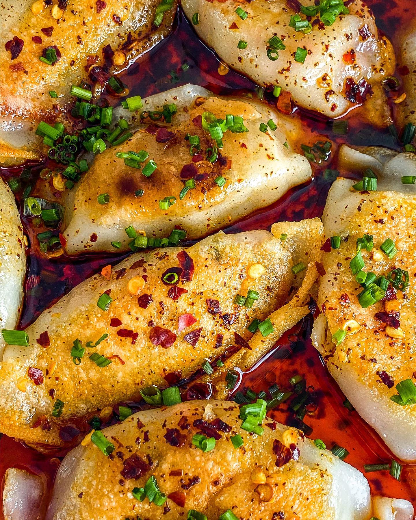 Vegan Gyoza with Mushroom, Tofu, and Carrot, Drizzled with Homemade Chili Oil