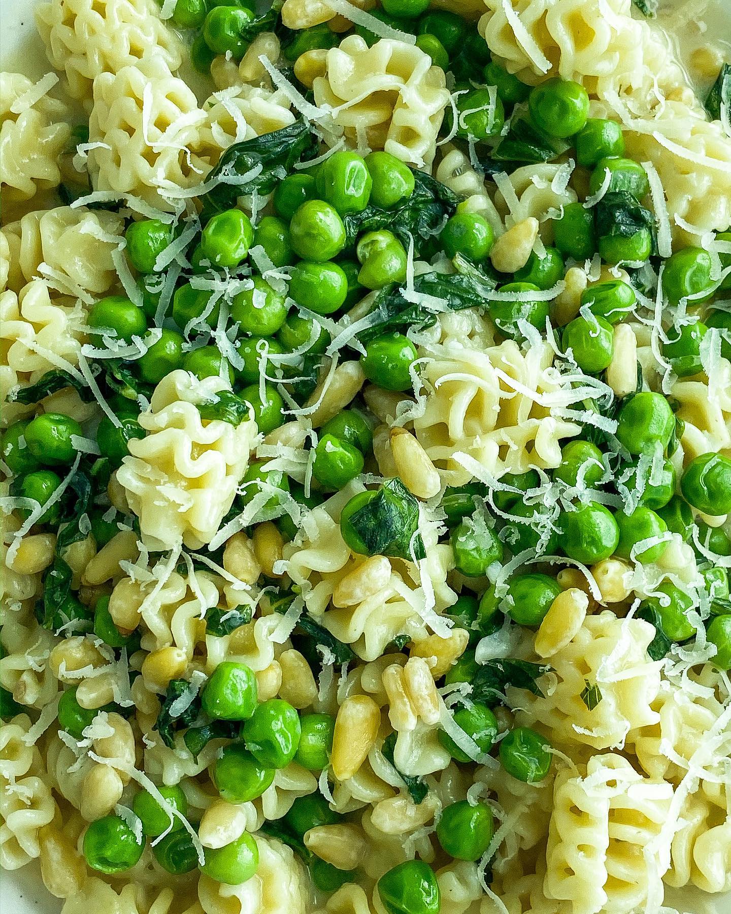 Creamy Vegan Radiatori with Green Peas, Pine Nuts, and Basil