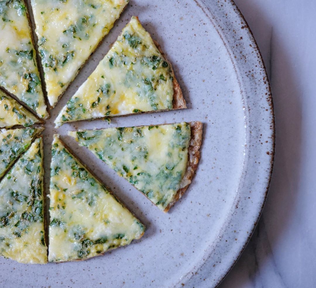 Breakfast Pizza with Eggs and Spinach