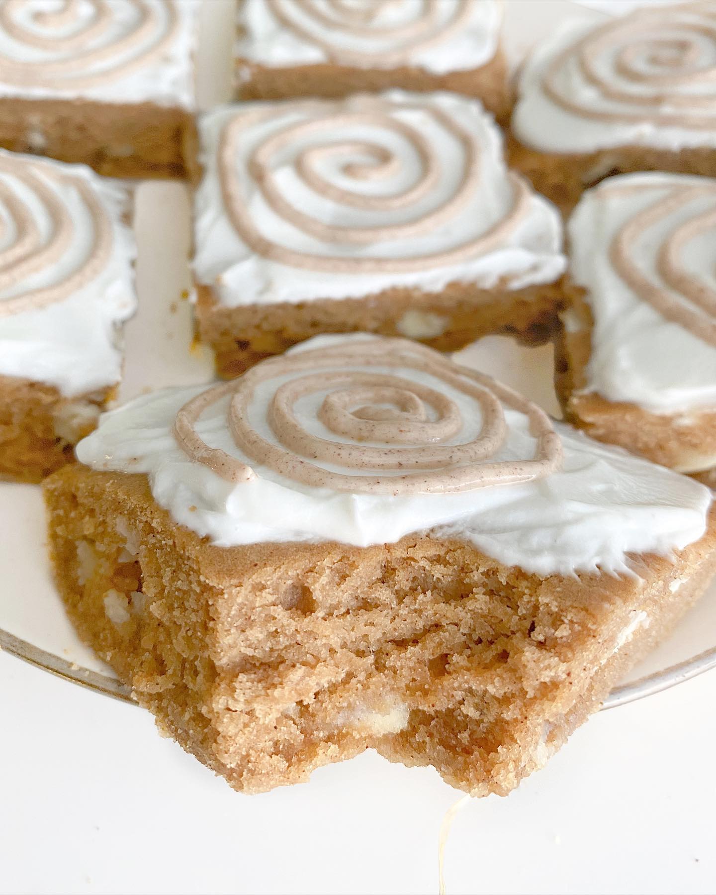 Fluffy Cinnamon Roll Bars with White Chocolate Chips