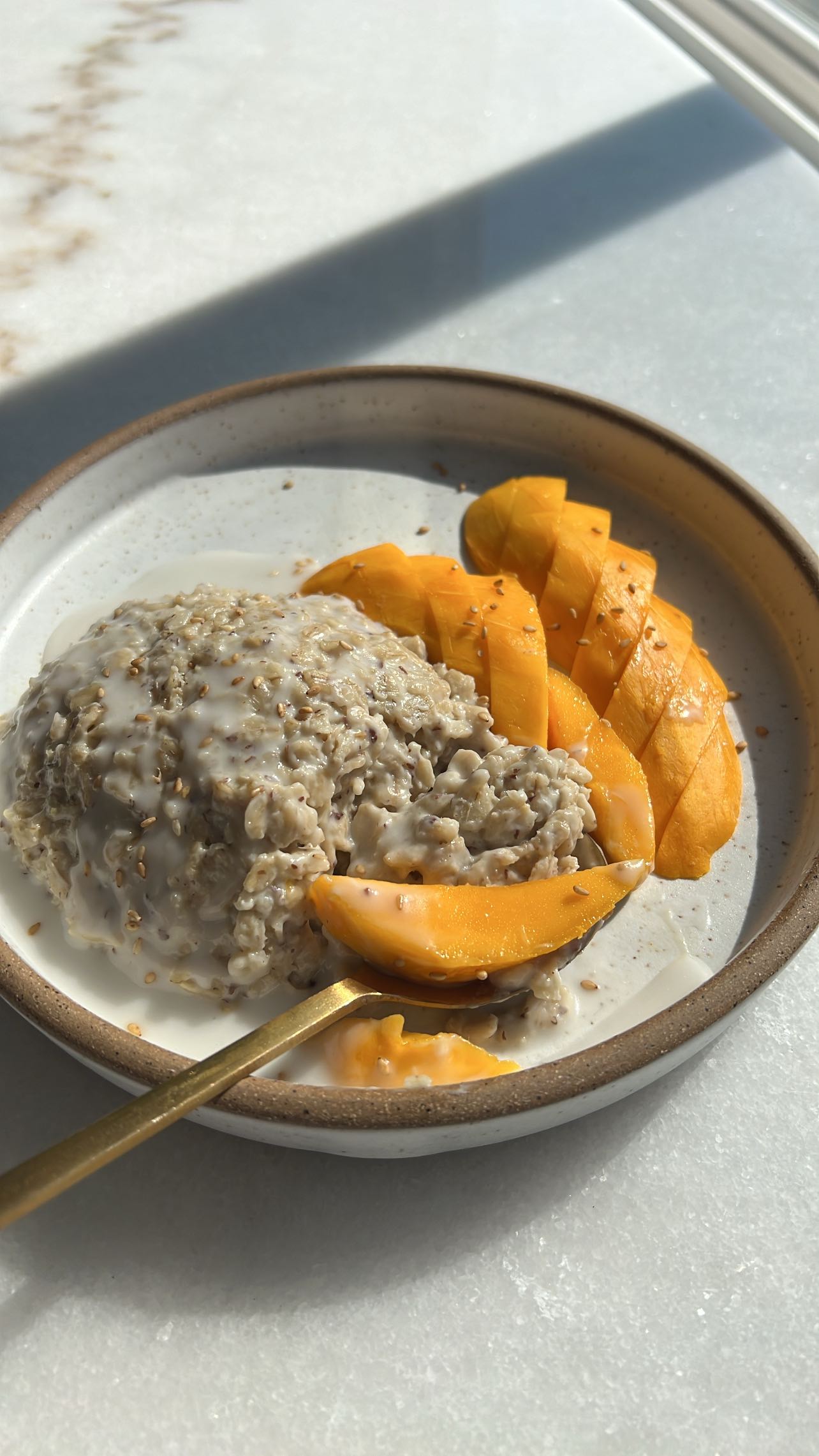 Mango Sticky Oatmeal with Coconut Sauce