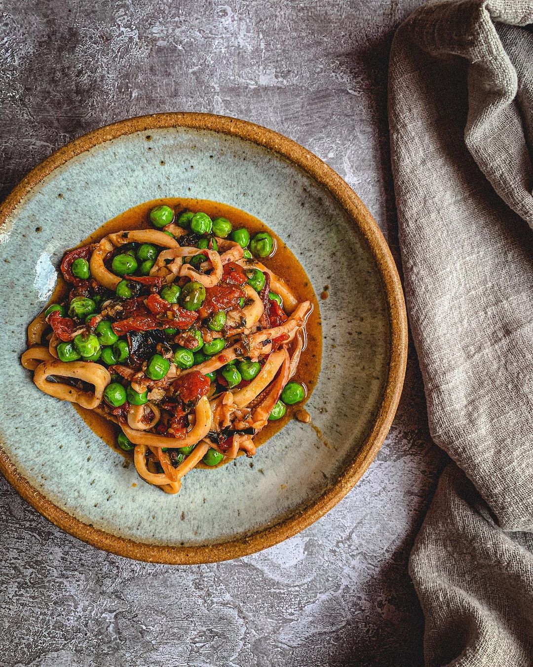Squid with Tomatoes and Peas