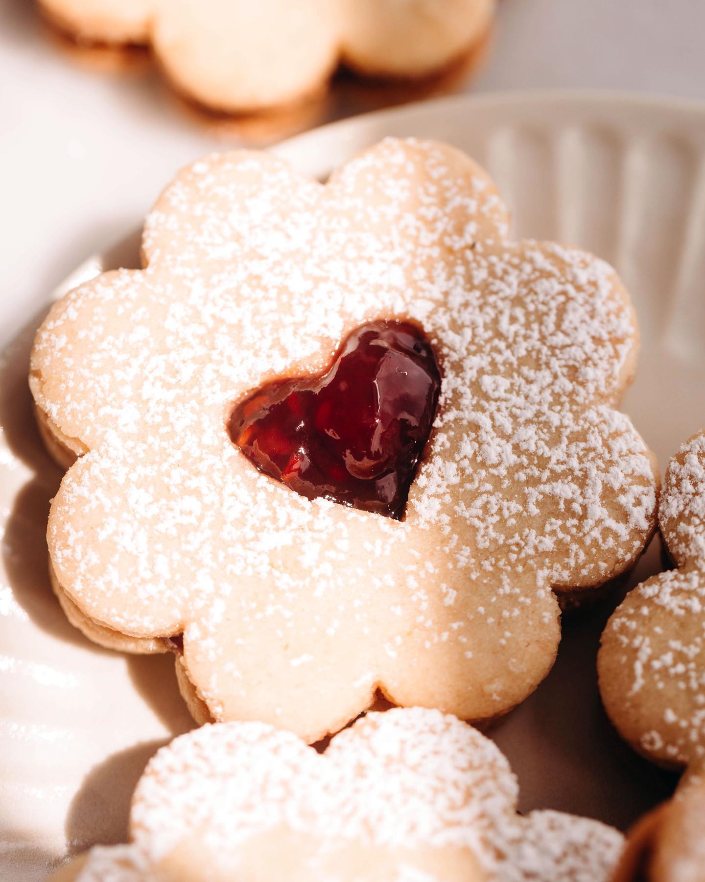 Linzer Flowers Cookies with Raspberry Pomegranate Filling