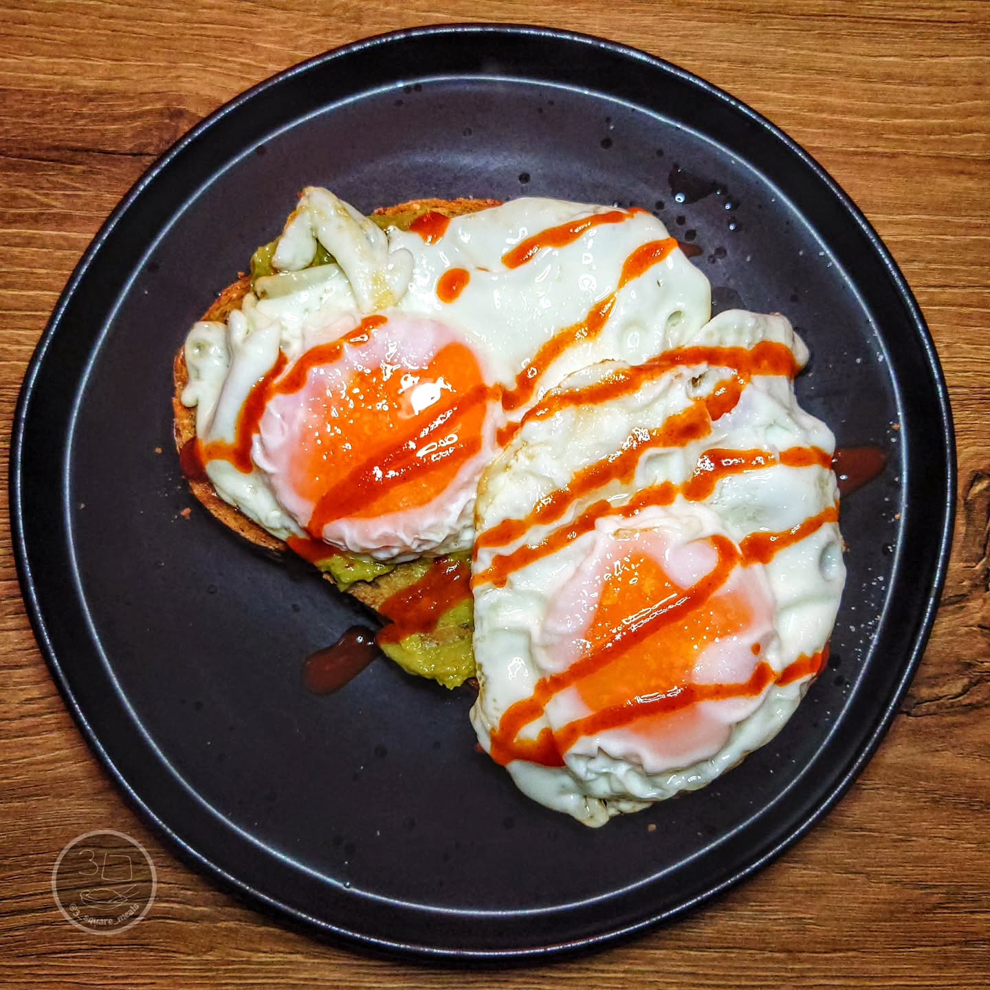 Eggs on Toast with Avocado and Sriracha