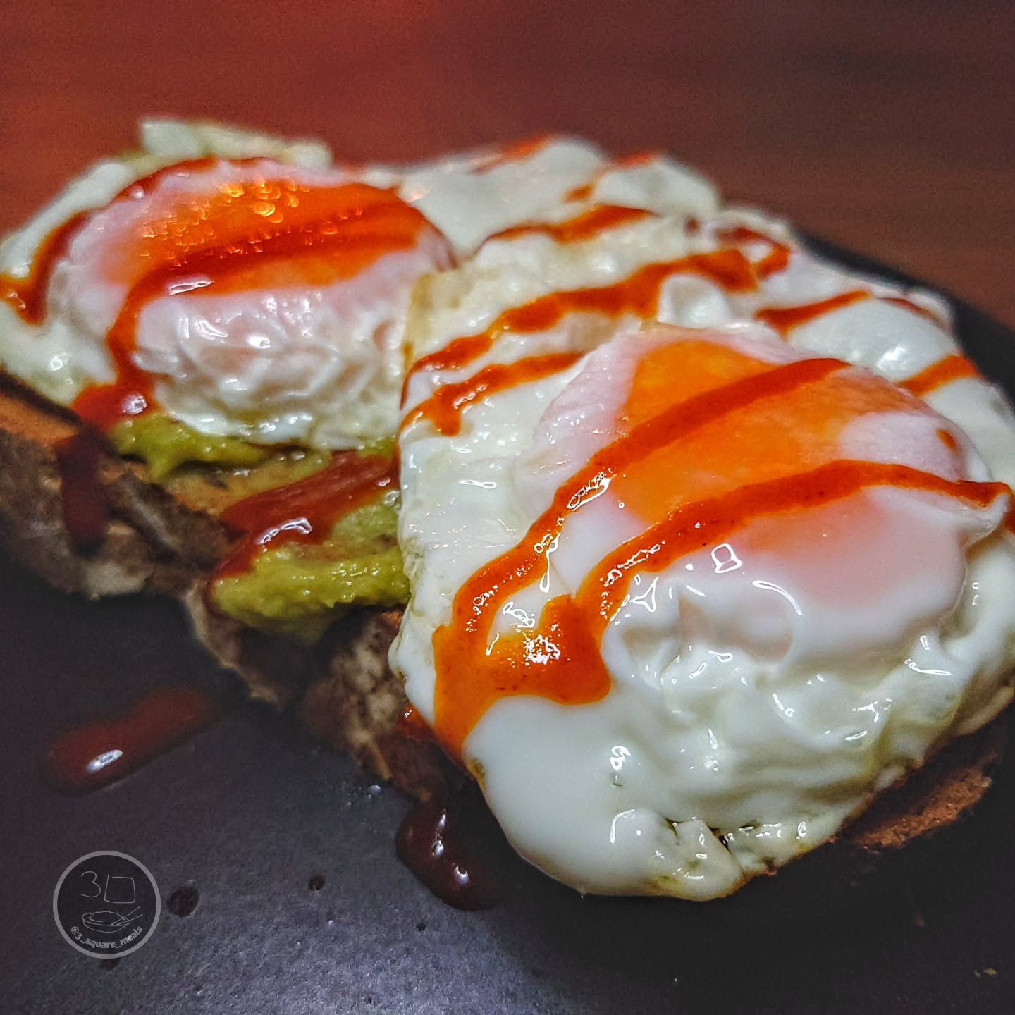 Eggs on Toast with Avocado and Sriracha