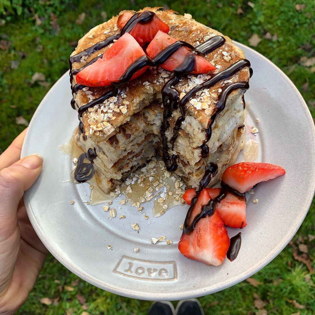 Banana Pancakes with Fresh Strawberries and Chocolate Sauce