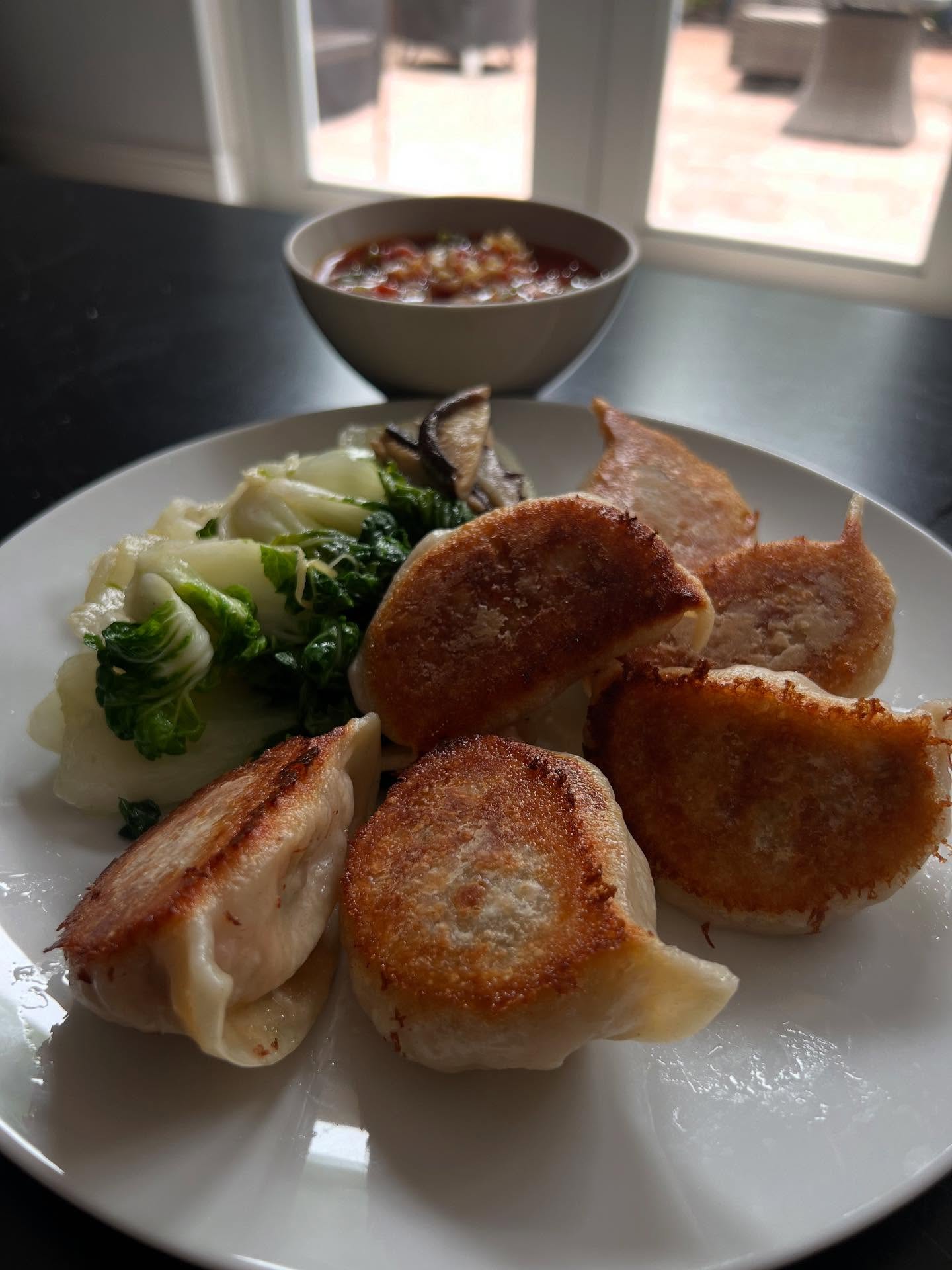 Crispy Chicken Dumplings with Spicy Salsa and Sautéed Bok Choy