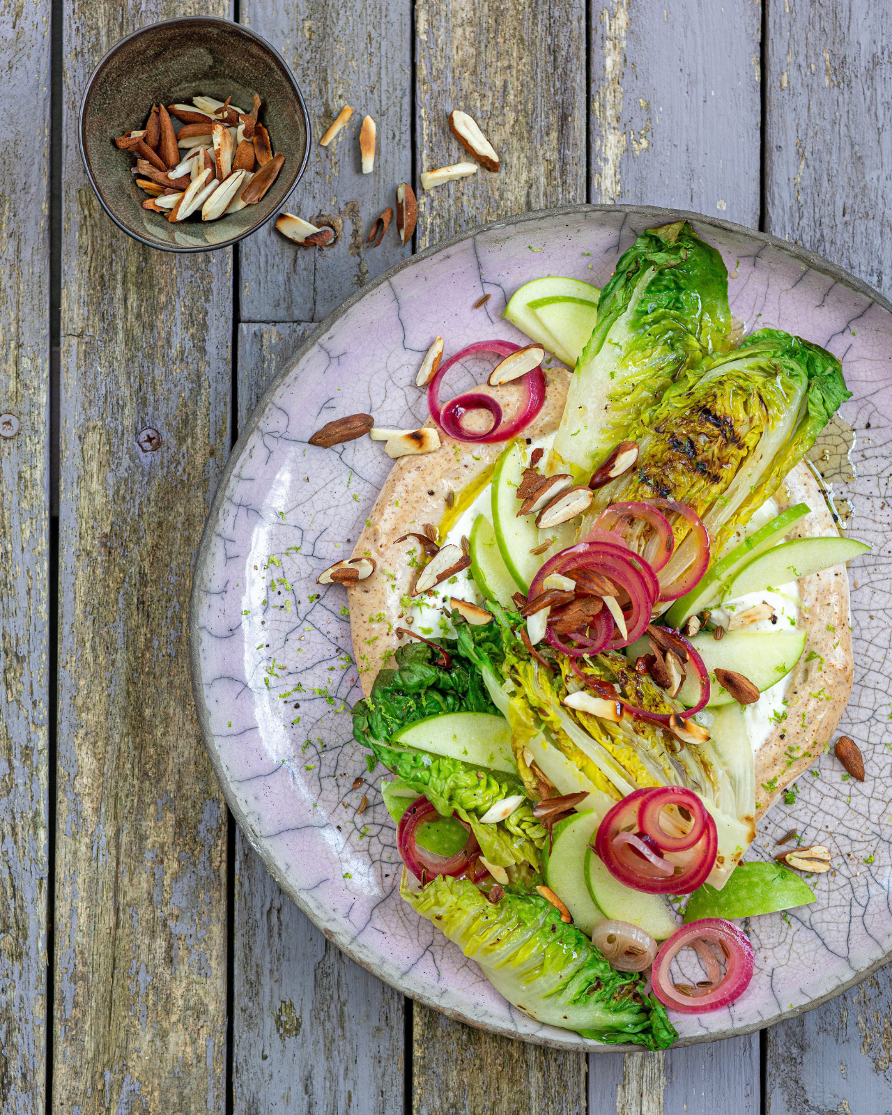 Grilled Romaine Hearts with Marinated Onions and Almond Cream