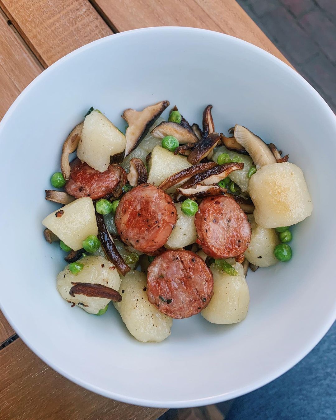 Cauliflower Gnocchi with Sausage, Peas, and Roasted Mushrooms
