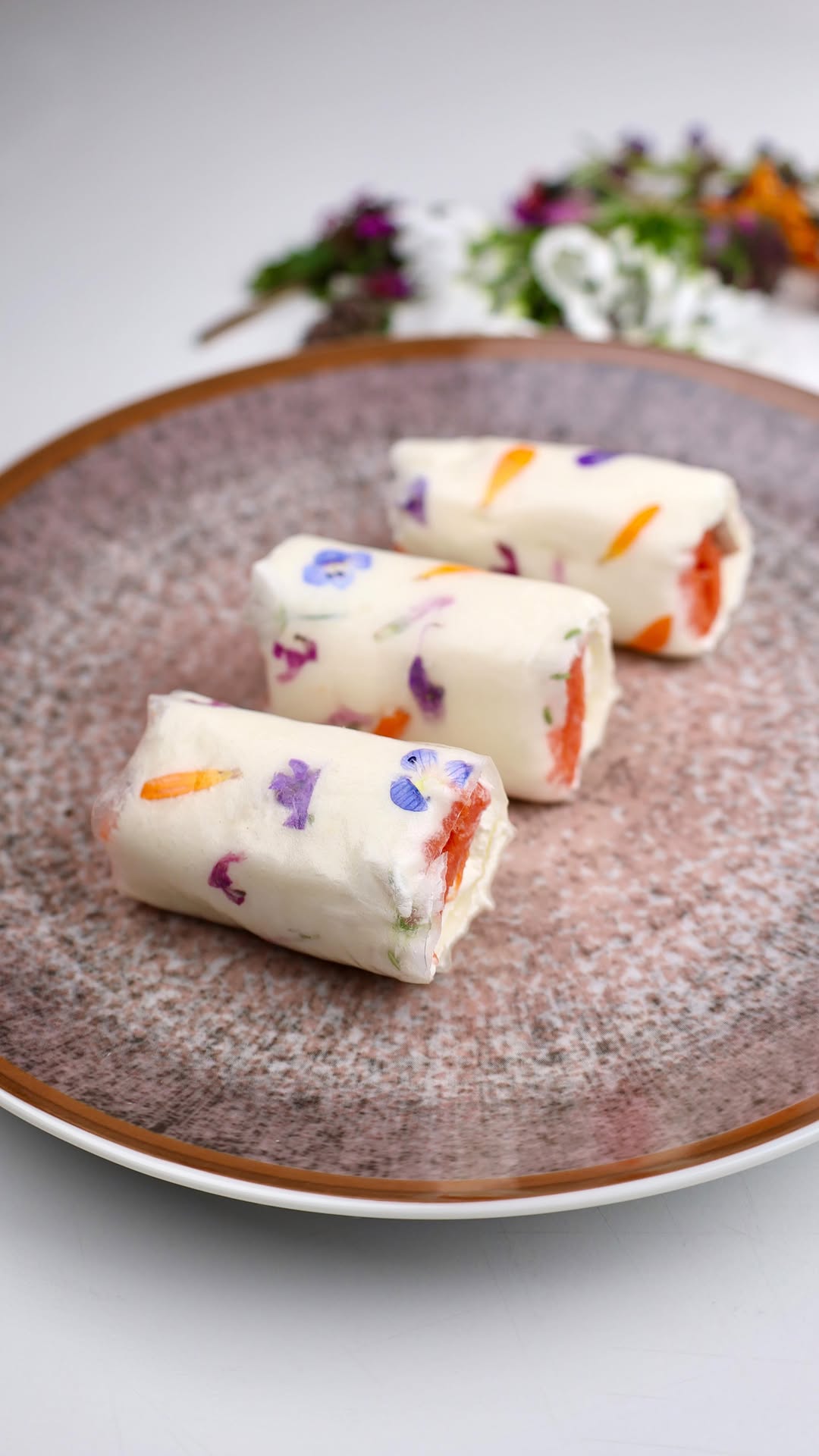 Salmon and Cream Cheese Rolls with Edible Flowers