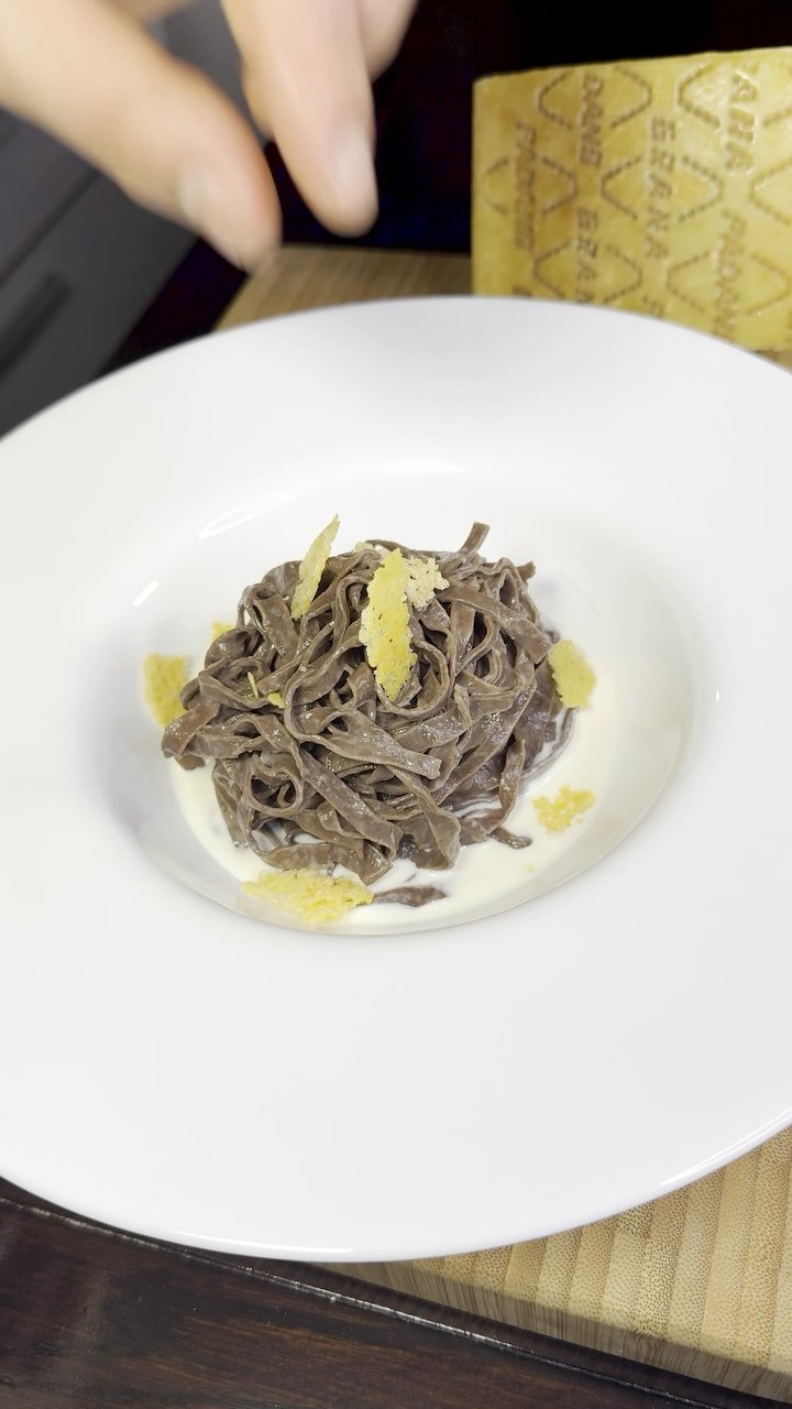 Chocolate Tagliolini with Grana Padano Fondue