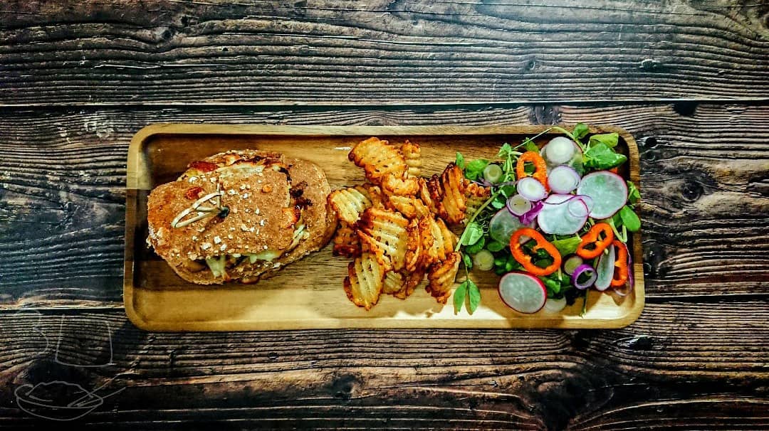 Gnocchi and Sausage Stuffed Bun with Chips and Salad