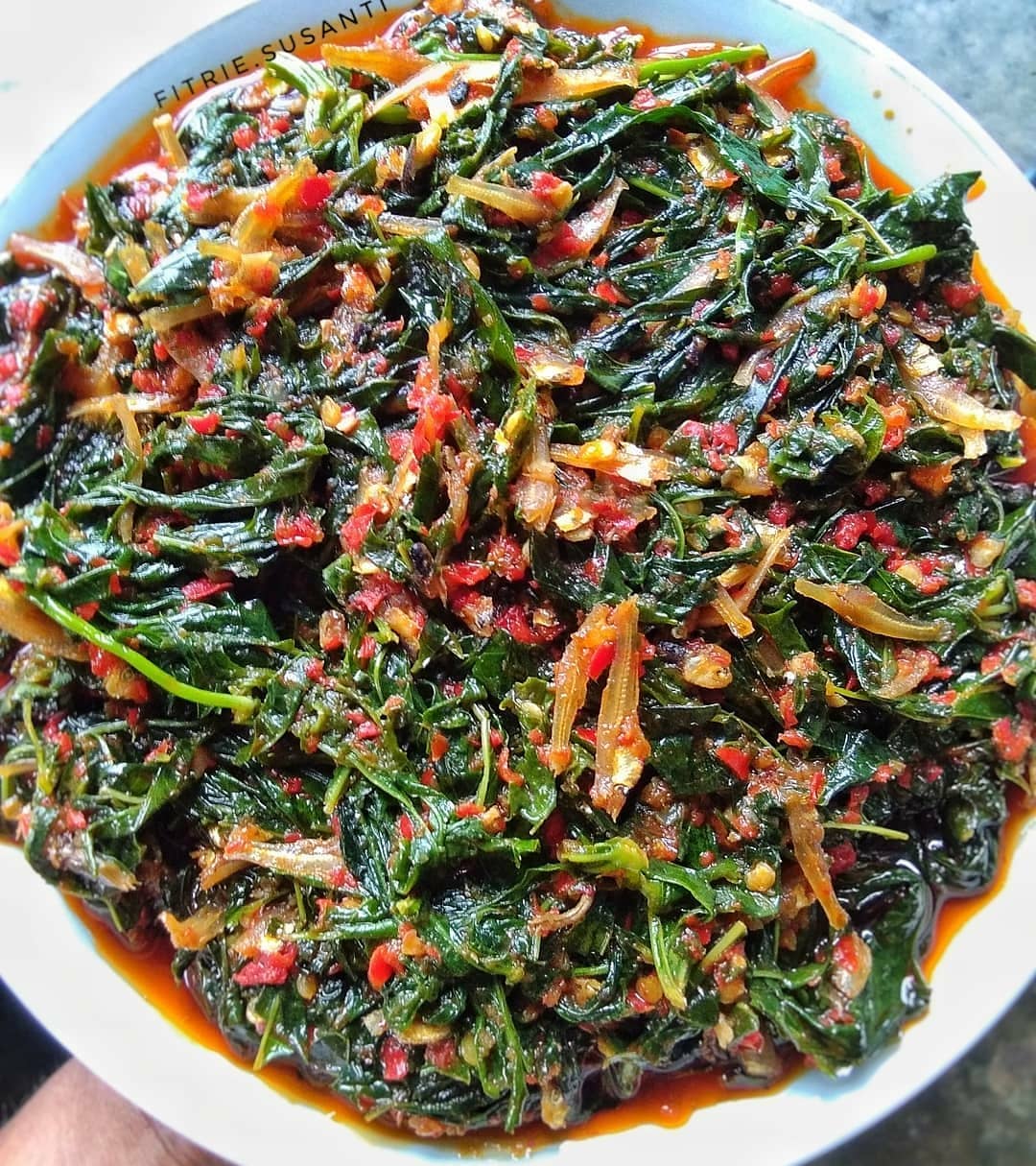 Spicy Stir-Fried Cassava Leaves with Anchovies