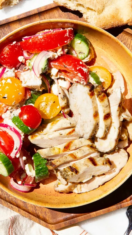Grilled Feta-Brined Chicken with Tomato Cucumber Salad