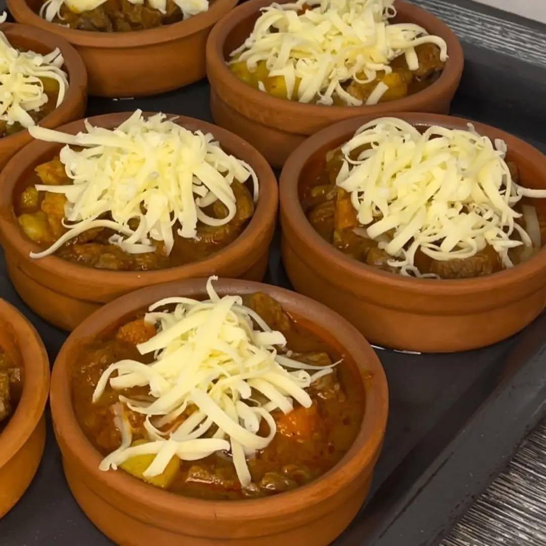 Cheese-Topped Turkish Tas Kebab