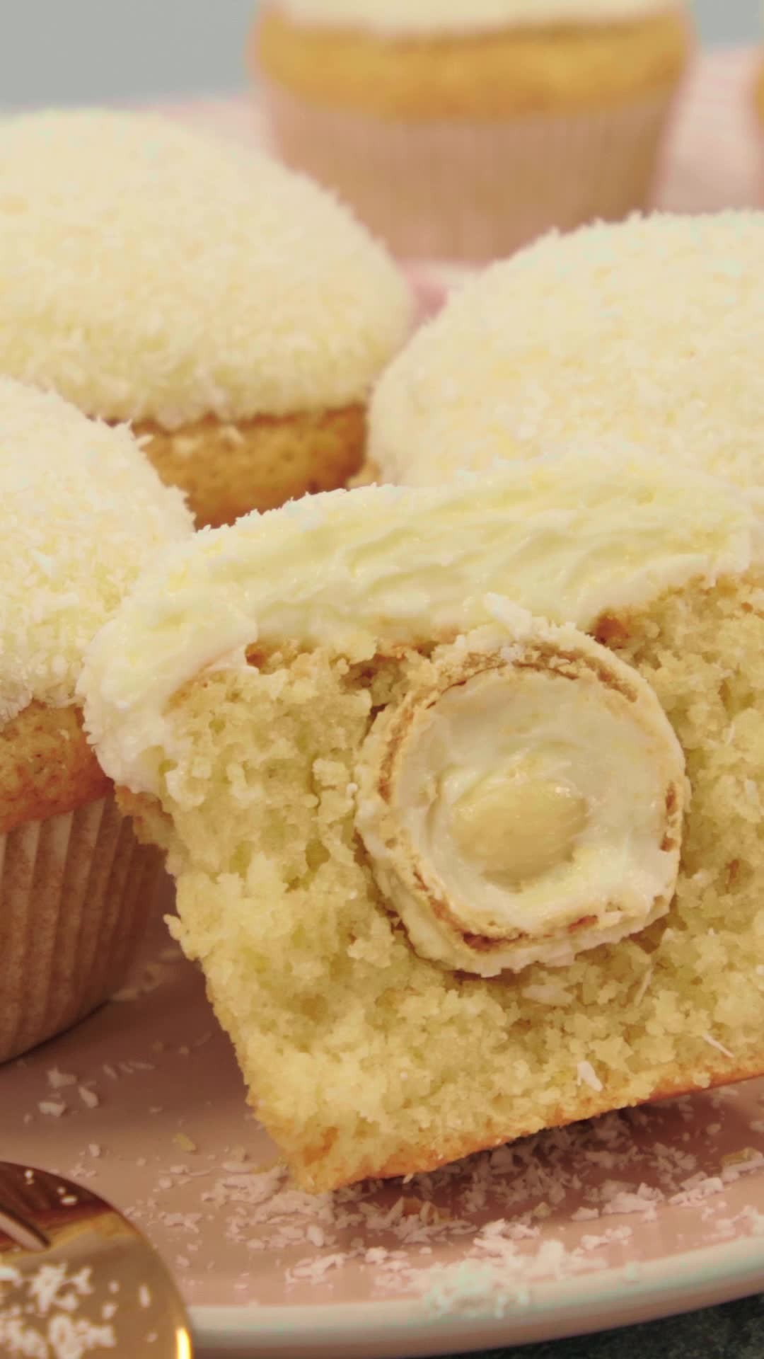 Coconut Raffaello Stuffed Muffins with Creamy Topping
