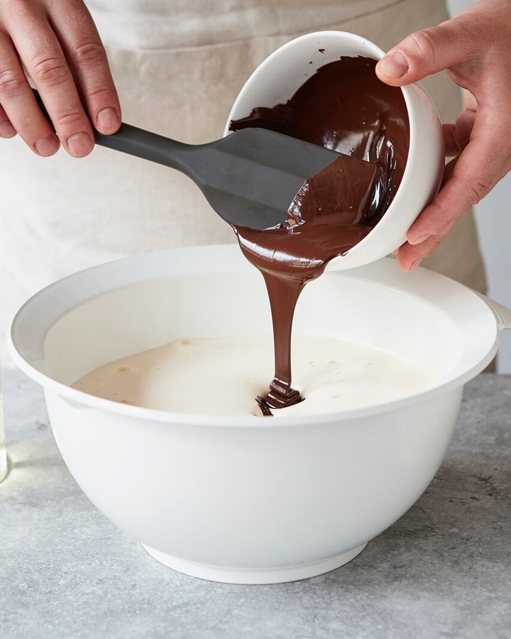 Moist Chocolate Poke Cake with Vanilla Pudding Filling