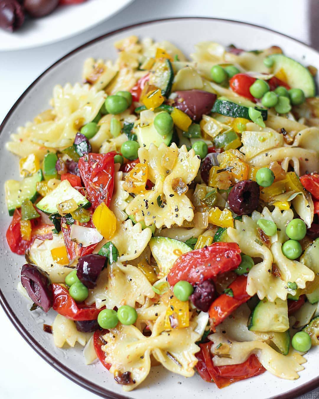 Roasted Tomato and Zucchini Farfalle with Olives and Peas