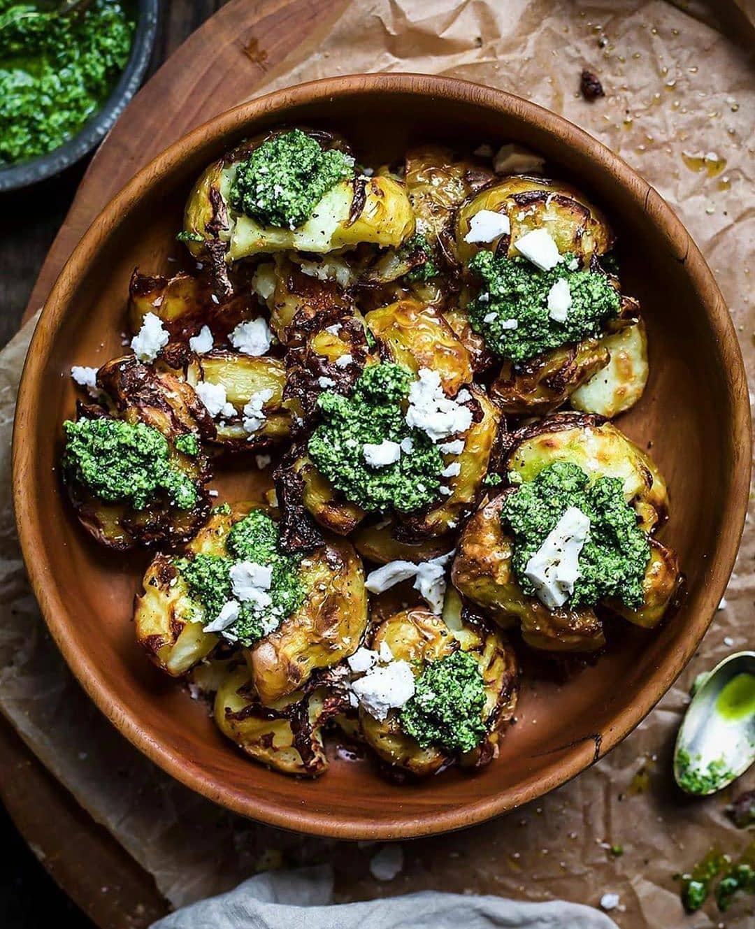 Crispy Baked Smashed Potatoes with Carrot Top Pesto