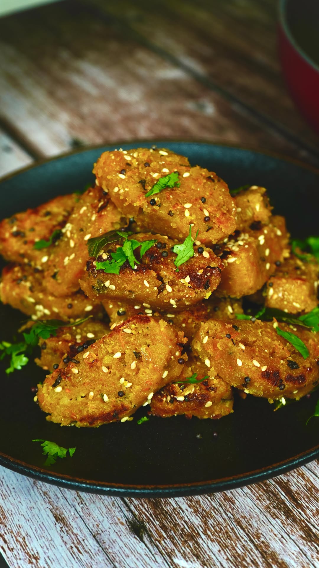 Steamed Vegetable Muthia with Tempering